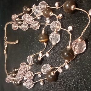 Rose gold tone 4 layers of pink crystals and brown cats eye quarts beads.